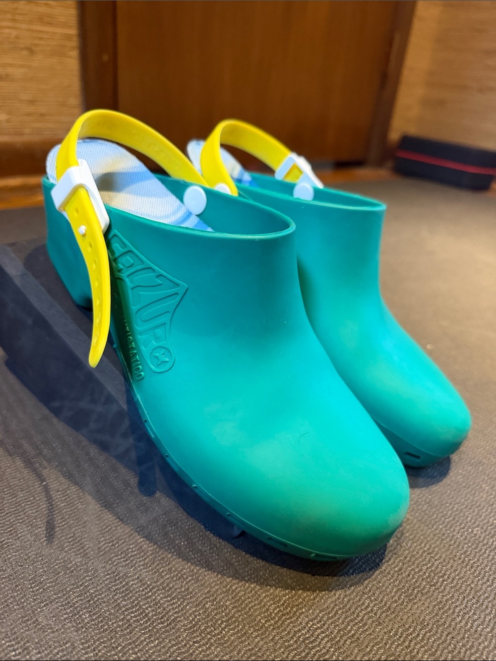 Women’s Teal Slip-On Clogs with Yellow Heel Strap